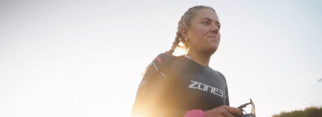 anya culling is getting ready for her triathlon swim, wearing her zone3 agile wetsuit