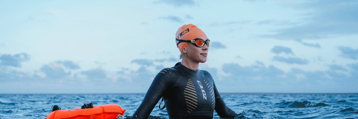 cold water swimmer wearing Zone3 Thermal Advance Wetsuit