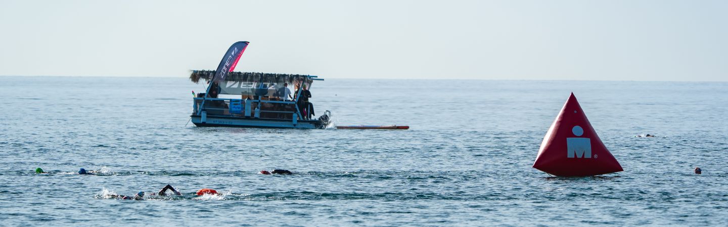 zone3 floating coffee boat in the water at marbella 70.3 world championships