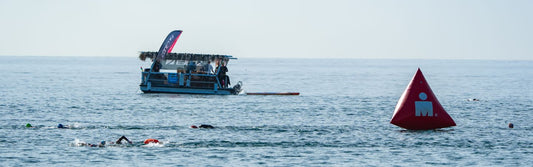 zone3 floating coffee boat in the water at marbella 70.3 world championships