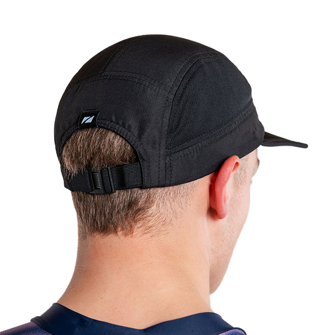 Person wearing black 5 panel running cap with zone3 logo on a white background