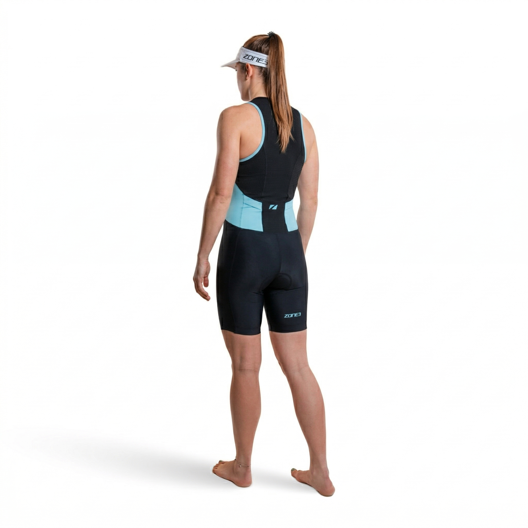 Women wearing a black and blue Activate Trisuit from the back on a white background