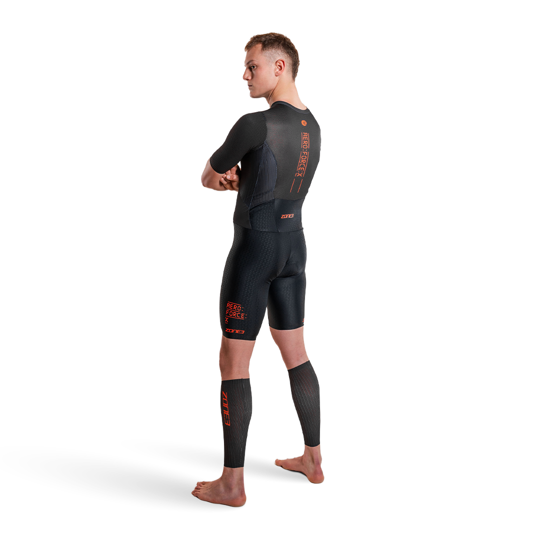 Person wearing Zone3 trsuit with  Aeroforce-X II Calf Sleeves