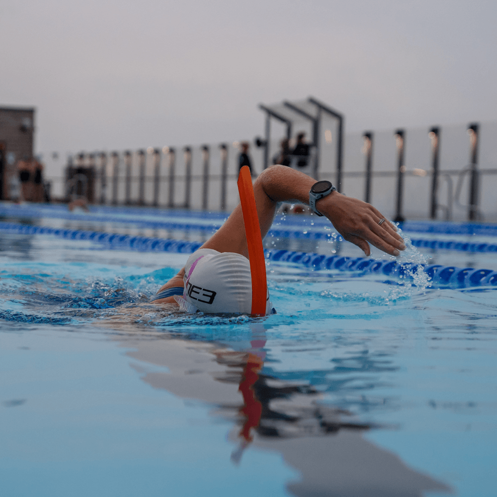 Athlete swimming in the pool using the Front facing snorkel 