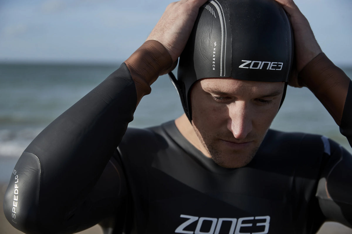Athlete wearing the Zone3 Heat tech swim cap.