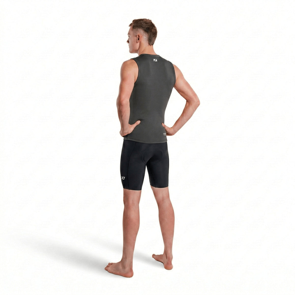 Man wearing black Zone3 Lava shorts on a white background from the back 