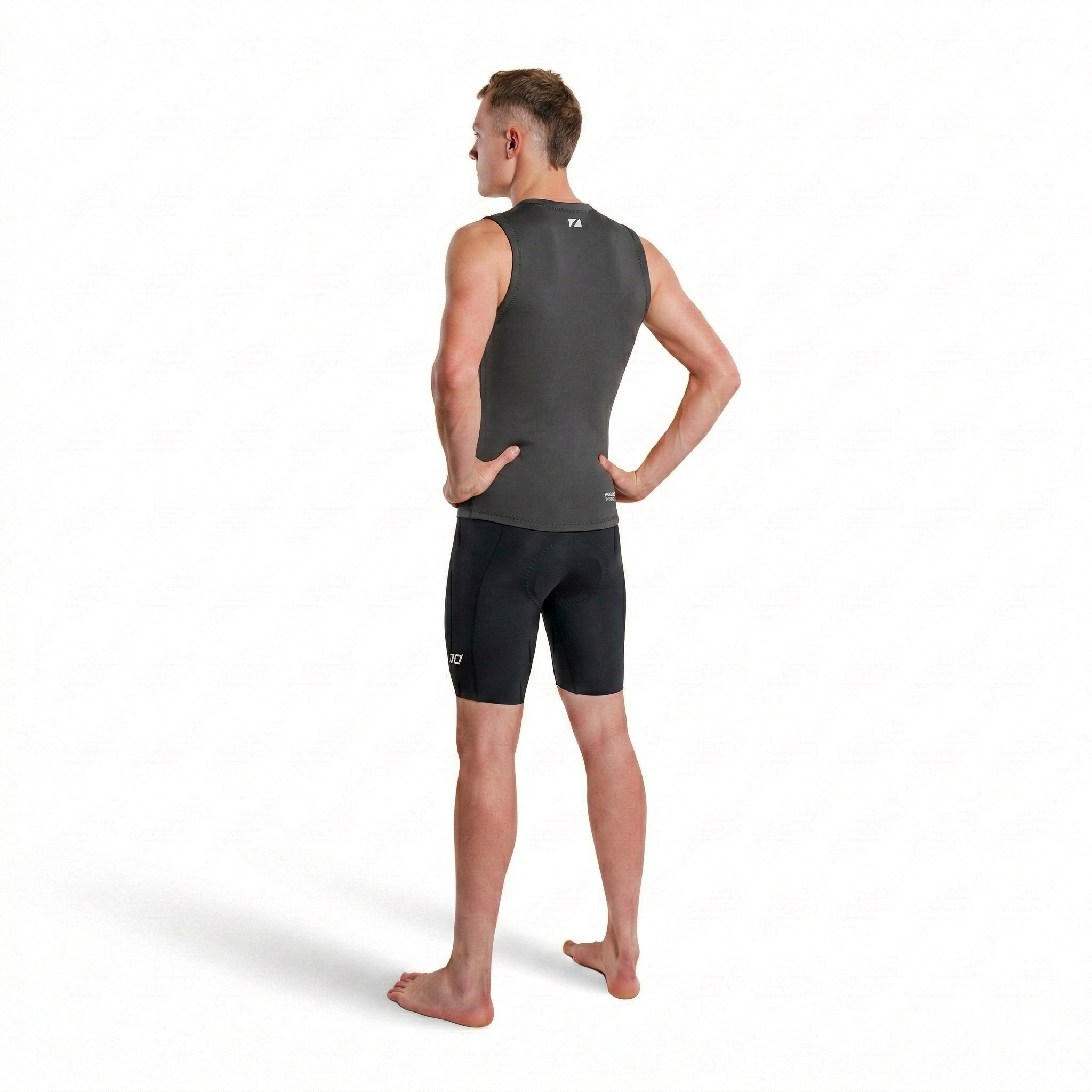Man wearing black Zone3 Lava shorts on a white background from the back 