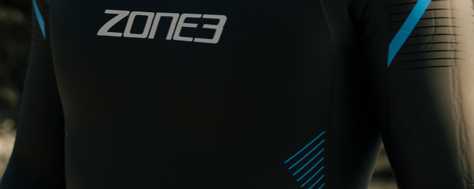 Close-up of a Zone3 wetsuit with branding.