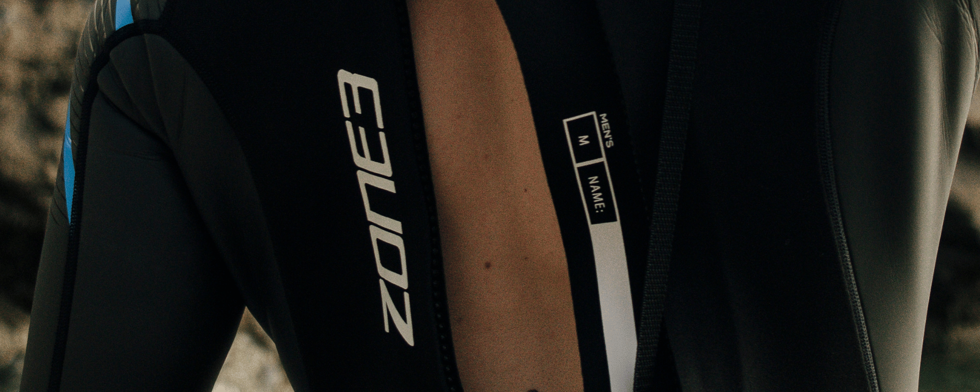 Person wearing a black athletic outfit with '360' branding on the back.