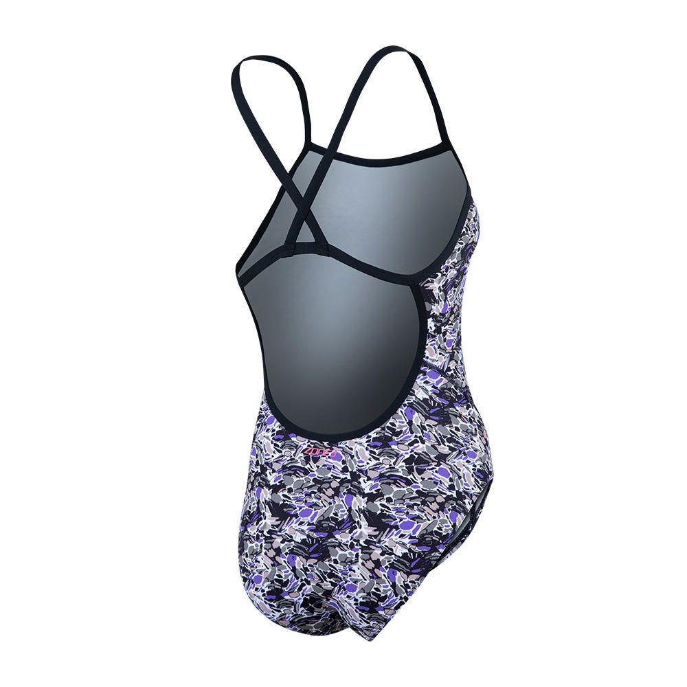 One-piece swimsuit with a black, white, and purple abstract pattern - the Pacific Koa print. Features thin black straps and a high-cut leg.