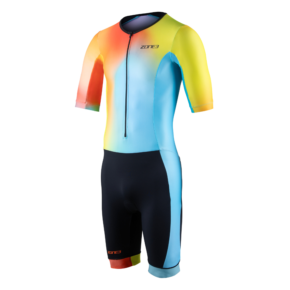 Front view of the ZONE3 Activate+ men’s short sleeve trisuit with a blue, yellow, and orange gradient upper and black shorts. Features a front zip and colour-blocked leg cuffs.