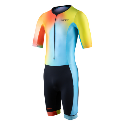 Front view of the ZONE3 Activate+ men’s short sleeve trisuit with a blue, yellow, and orange gradient upper and black shorts. Features a front zip and colour-blocked leg cuffs.