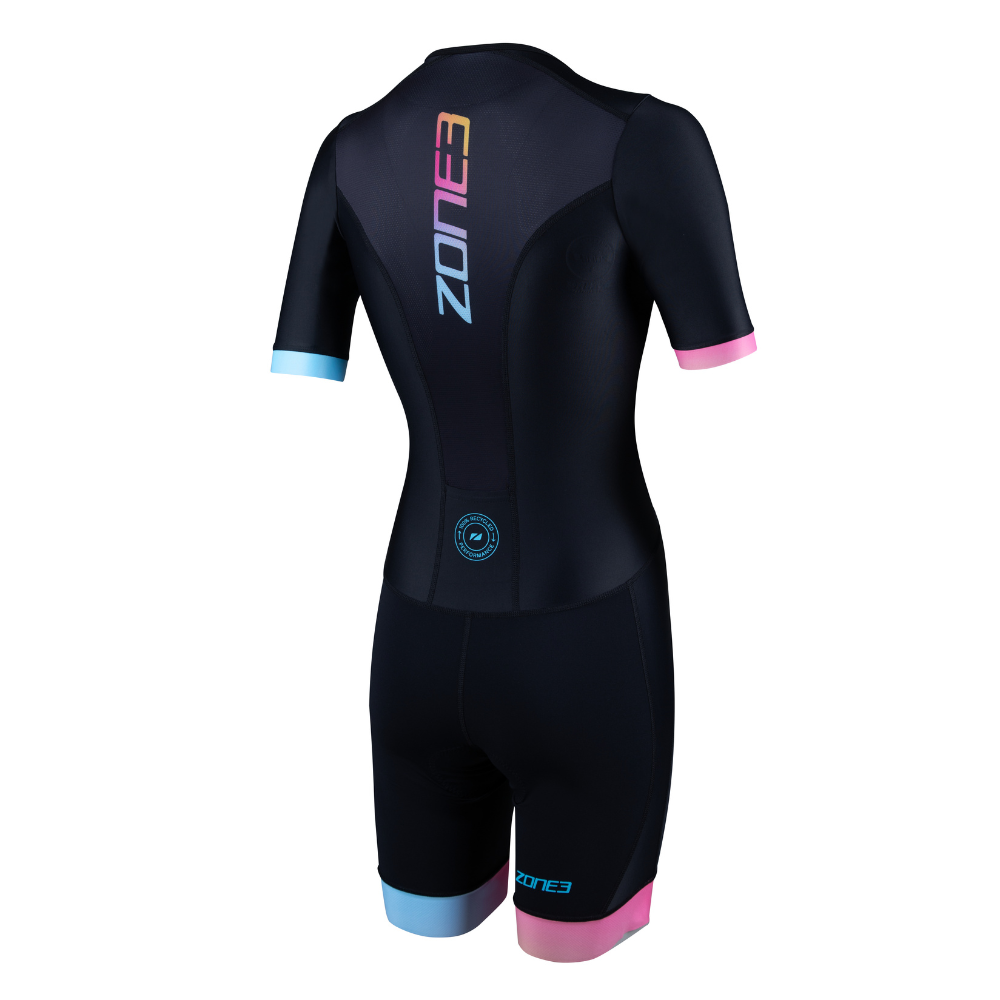 Back view of the ZONE3 Activate+ women’s short sleeve trisuit in black, with a vertical ZONE3 logo in gradient colours and contrasting pink and blue cuffs.