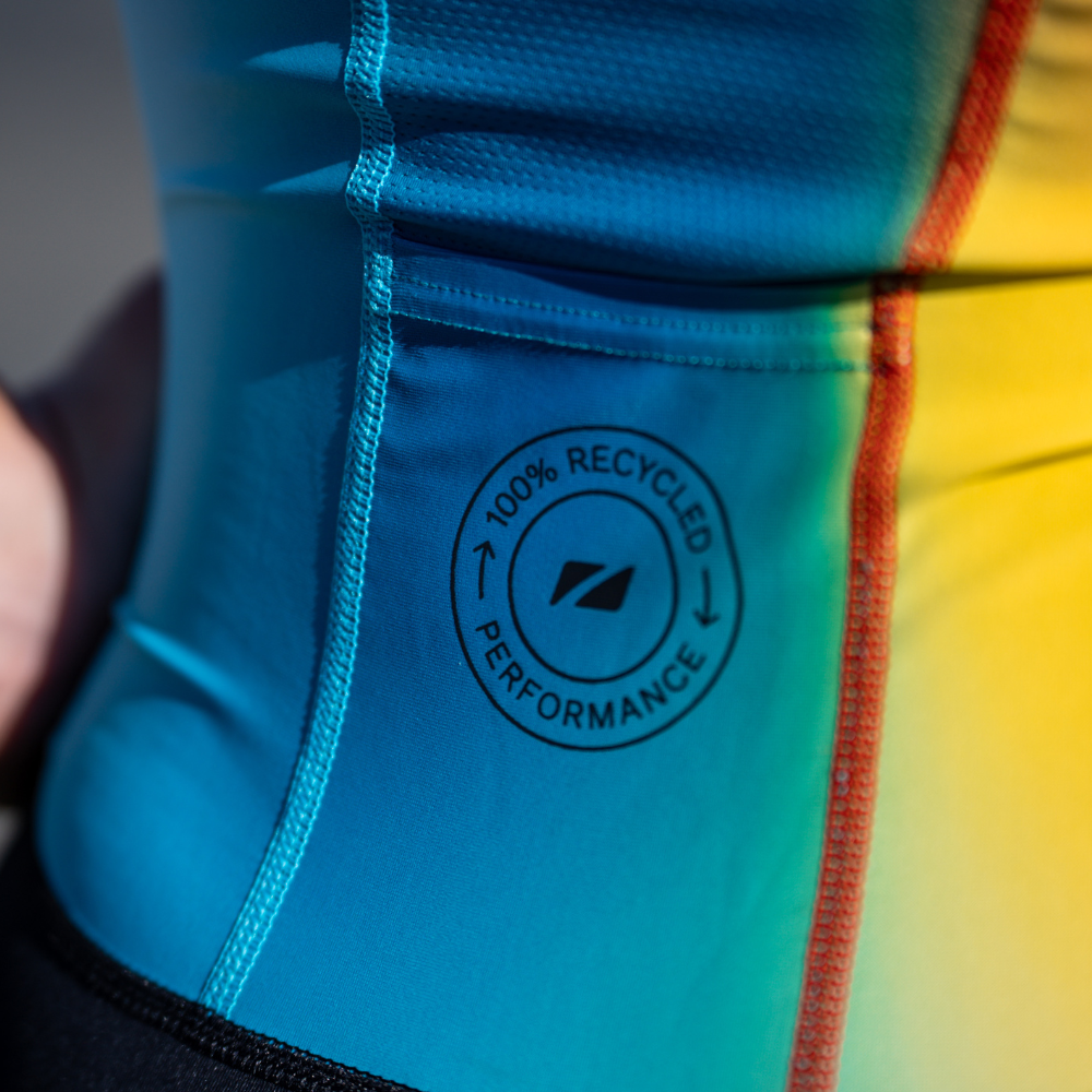 Close-up of the trisuit’s rear side panel showing the text 