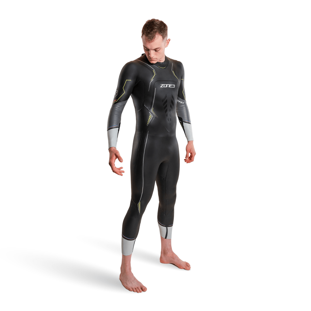 Aspire Wetsuit worn by a male model displaying its sleek design and performance features.