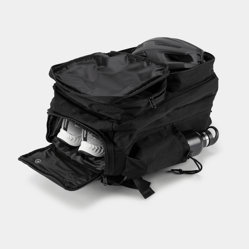 Built For Athletes x ZONE3 45L Transition Backpack open, showcasing storage for gear and essentials.
