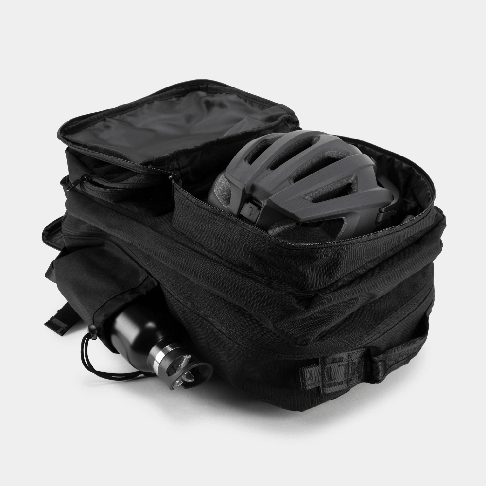 Built For Athletes x ZONE3 45L Transition Backpack with helmet and water bottle compartments.