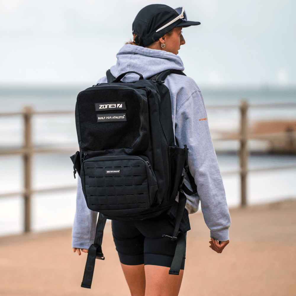 Built For Athletes x ZONE3 45L Transition Backpack worn by a triathlete outdoors.