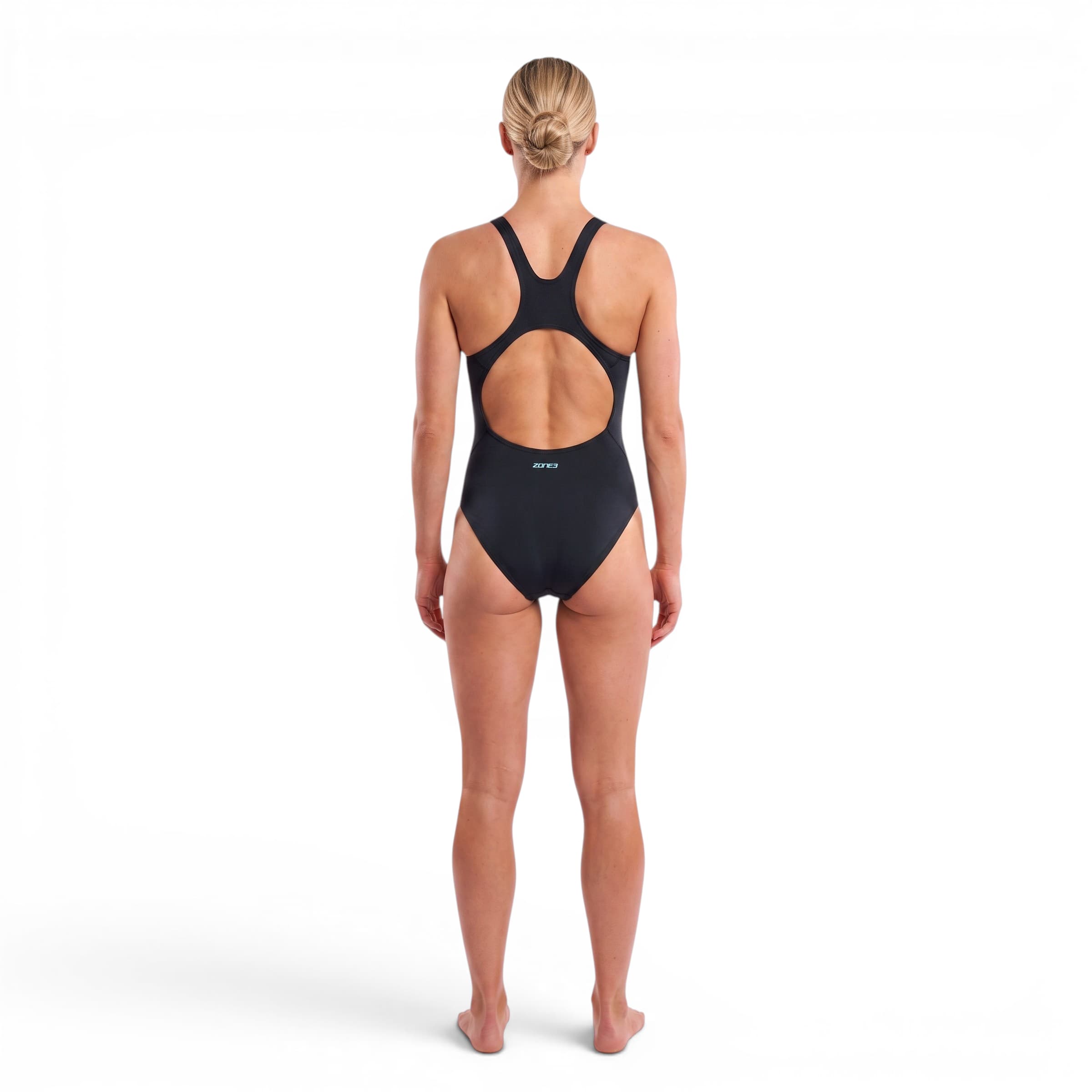 An athlete wearing the Zone3 Black classic swimsuit. back facing on a white background. 