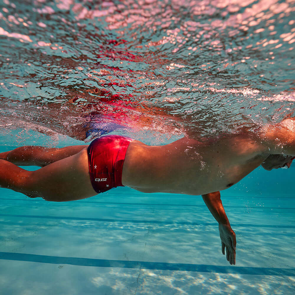 Person swimming in Brief Shorts (USA) featuring American Flag style and premium design.
