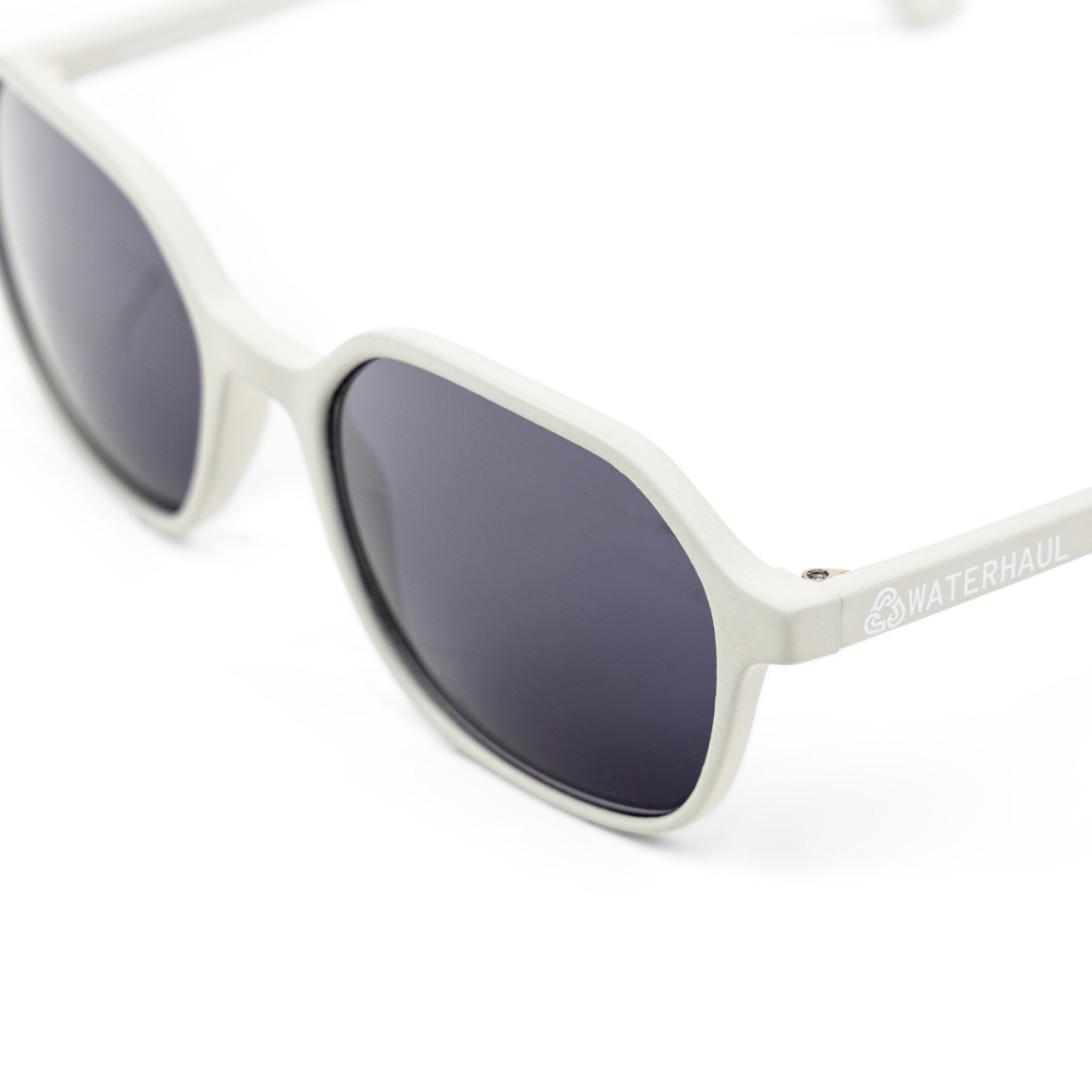 Waterhaul Droskyn Dune Sunglasses in sandy grey, showcasing a stylish and modern design.