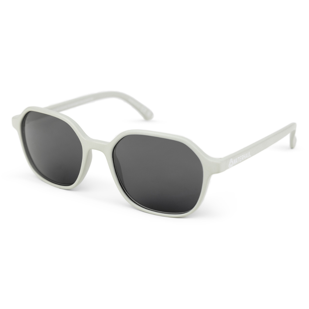 Waterhaul Droskyn Dune Sunglasses in sandy grey with black lenses, designed for unisex comfort and style.